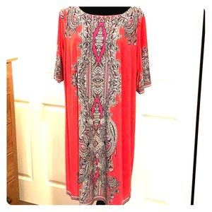 Color is pinkish/orangish depending on light